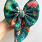 TEAL TOY STORY BOW